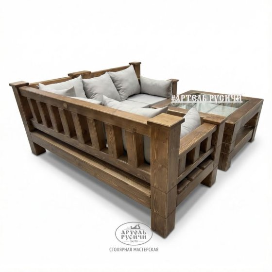 Угловой диван из массива дерева с мягкими подушками и журнальный столик в стиле лофт 