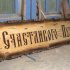 Деревянная вывеска из массива сосны под старину с резьбой